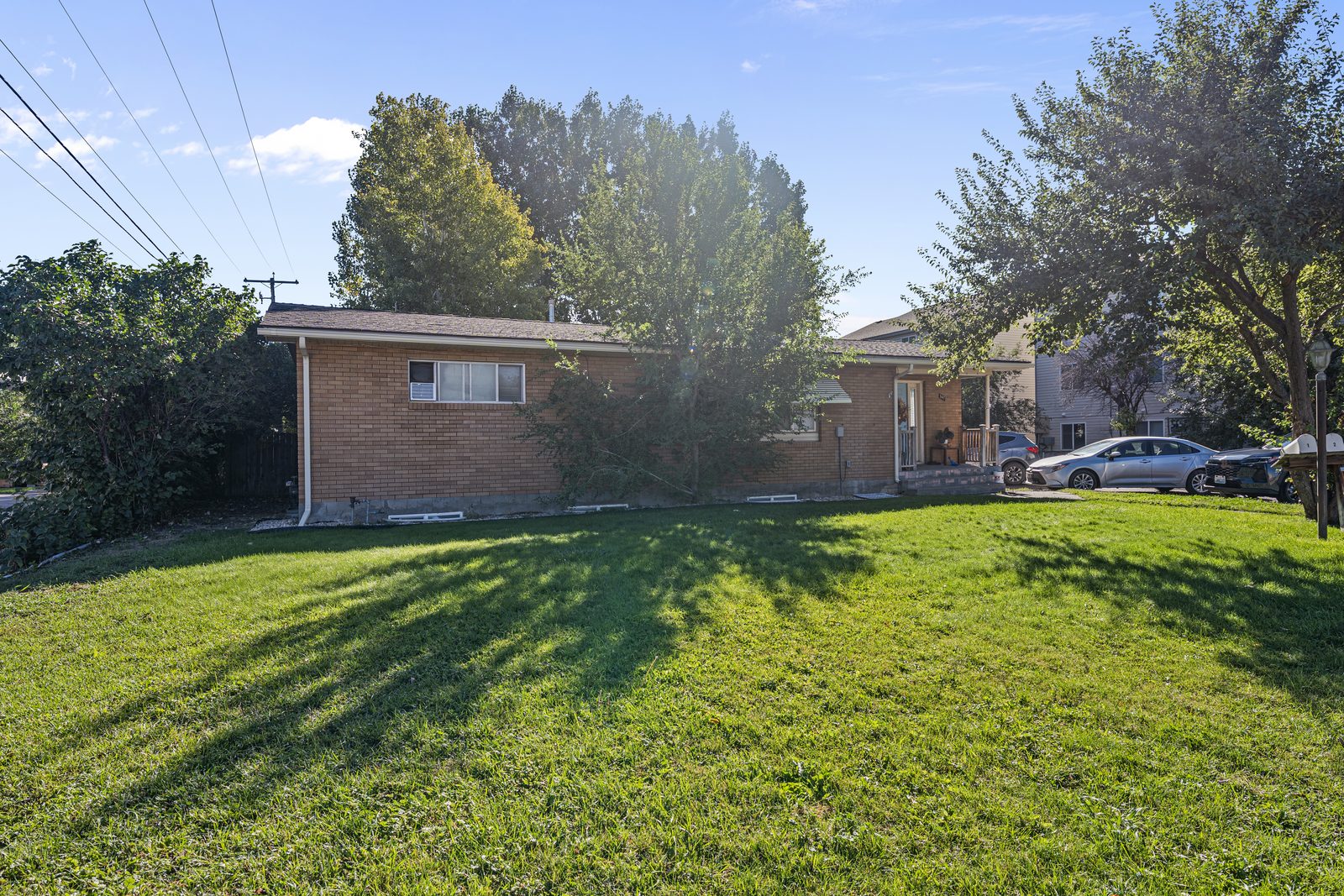Front of the brick fourplex at 343 S 4th W