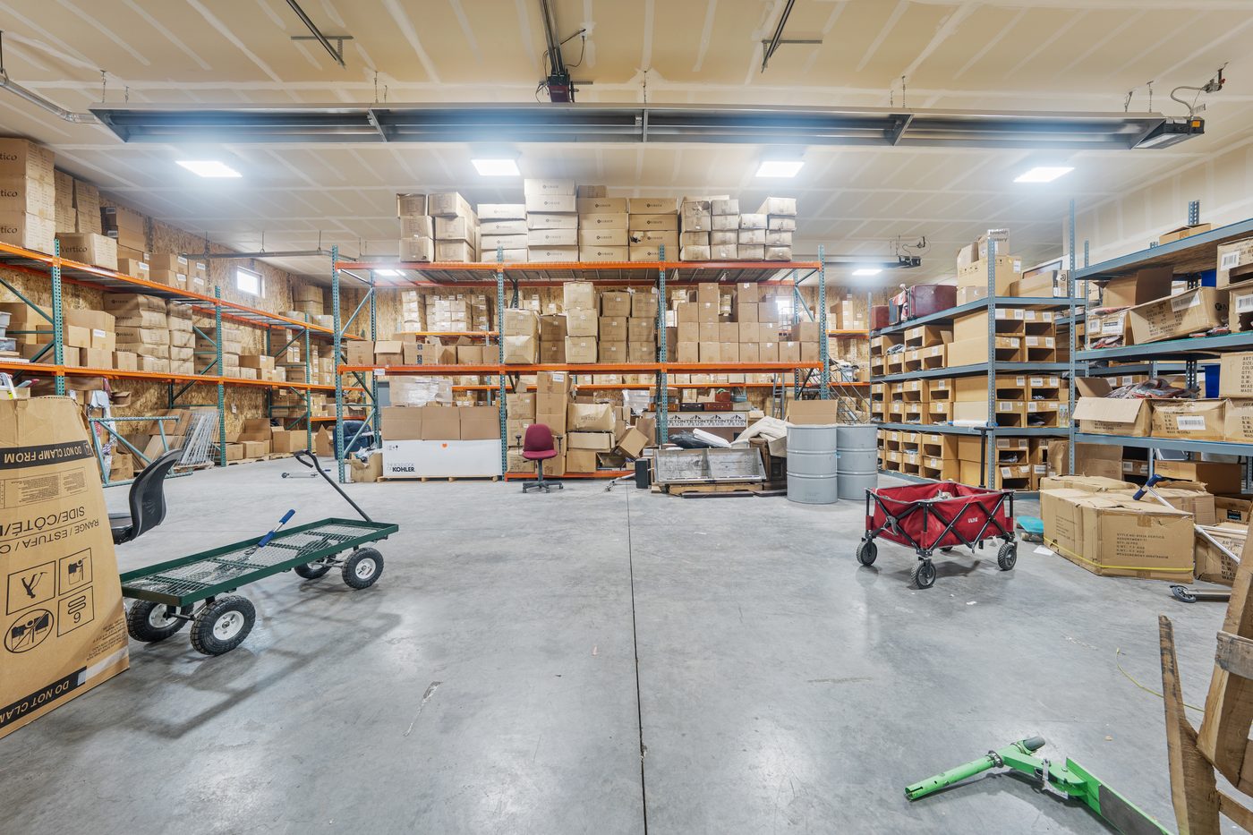 Warehouse with tall pallet racking and open floor