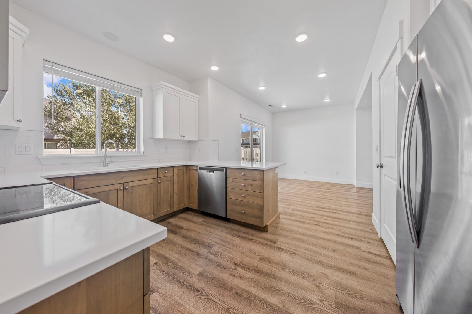 Kitchen with quartz island and walk-in pantry